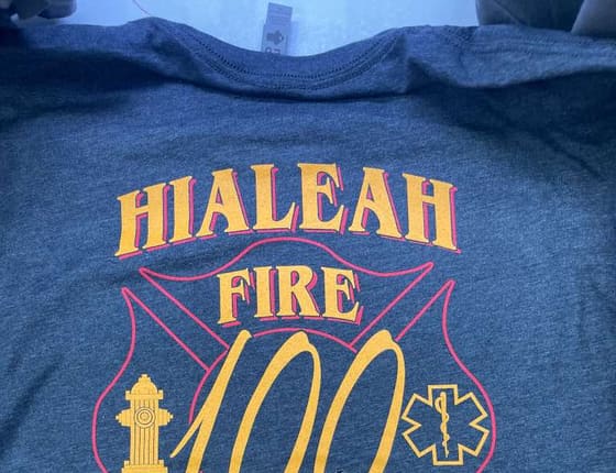 Multi-color printed design on a heather t-shirt